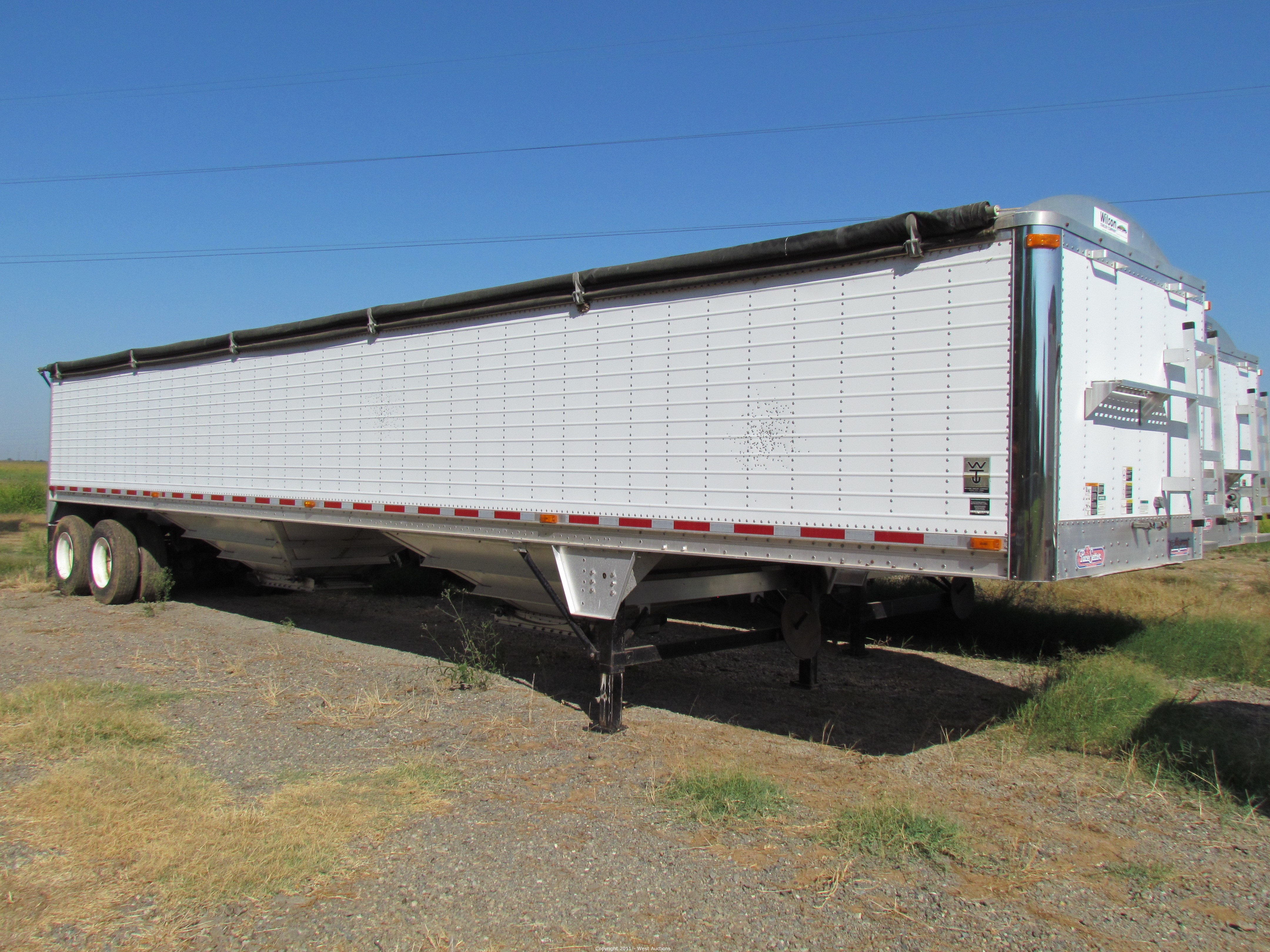 West Auctions Auction Grain Hopper Trailers, Dump Trailer, Chisel