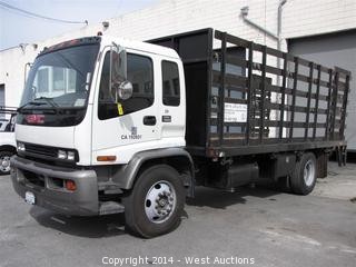 1999 GMC T6500 Stakeside Flatbed Diesel Truck with Lift Gate