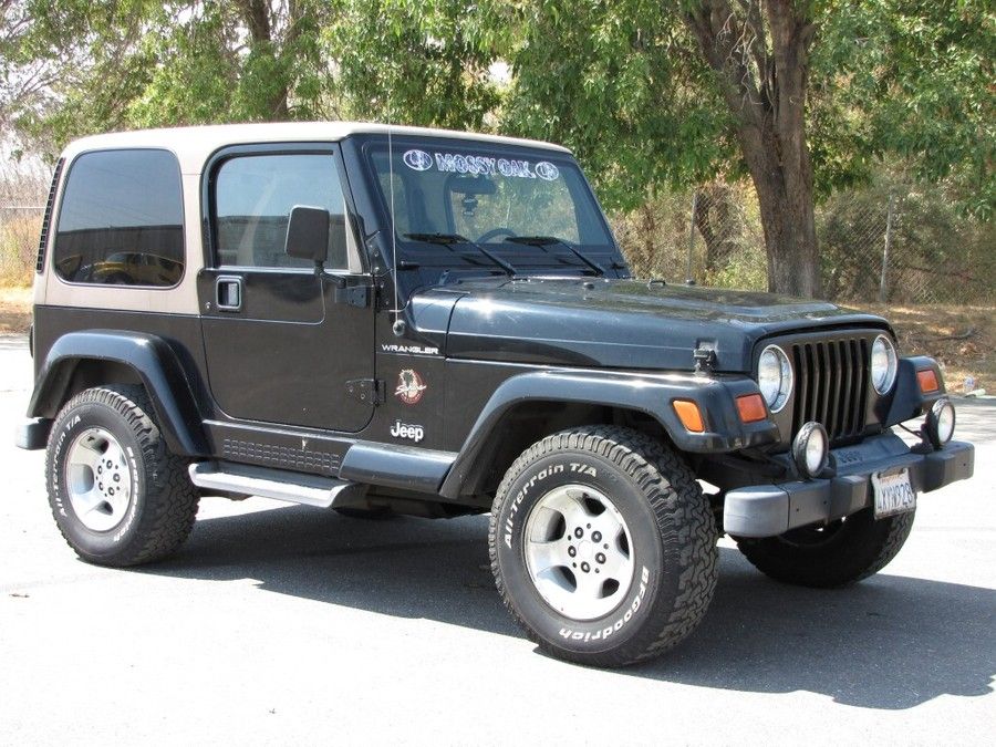West Auctions - Auction: 2002 Jeep Wrangler Sahara Edition 4x4 ITEM: 2002  Jeep Wrangler Sahara Edition 4x4