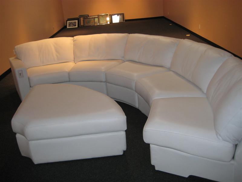 small curved white leather sofa