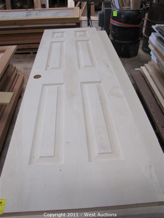 West Auctions Auction Door and Trim Shop in Newcastle, California ITEM Stack of (20) Doors