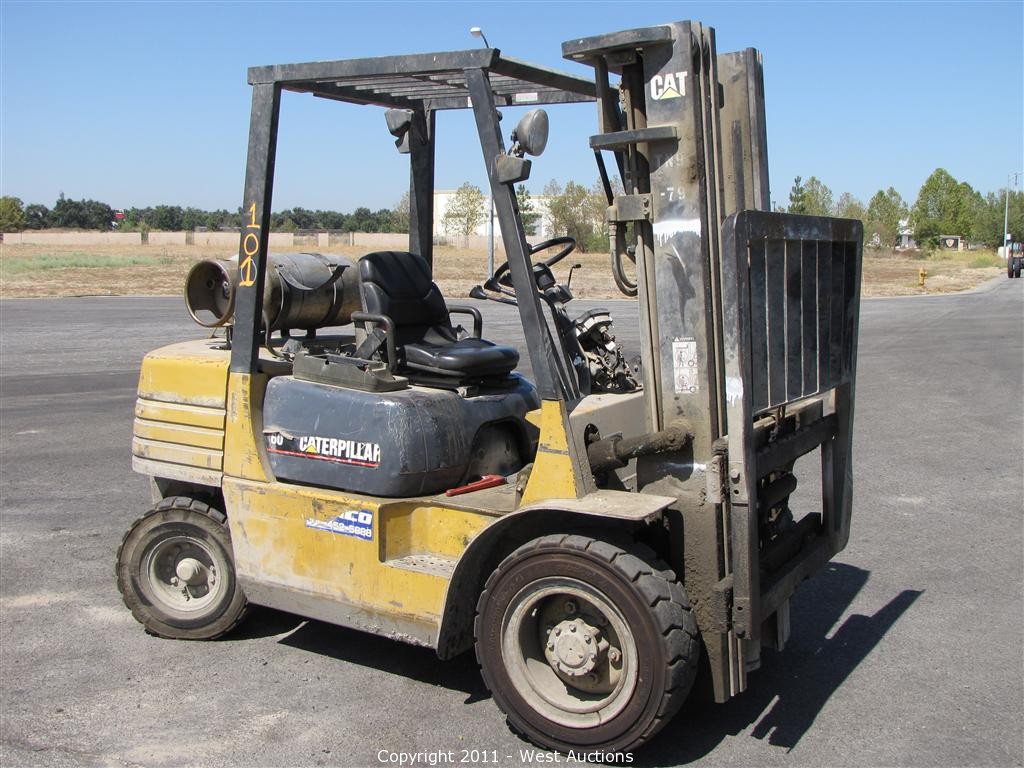 West Auctions Auction Mitsubishi Forklift and Caterpillar Forklift