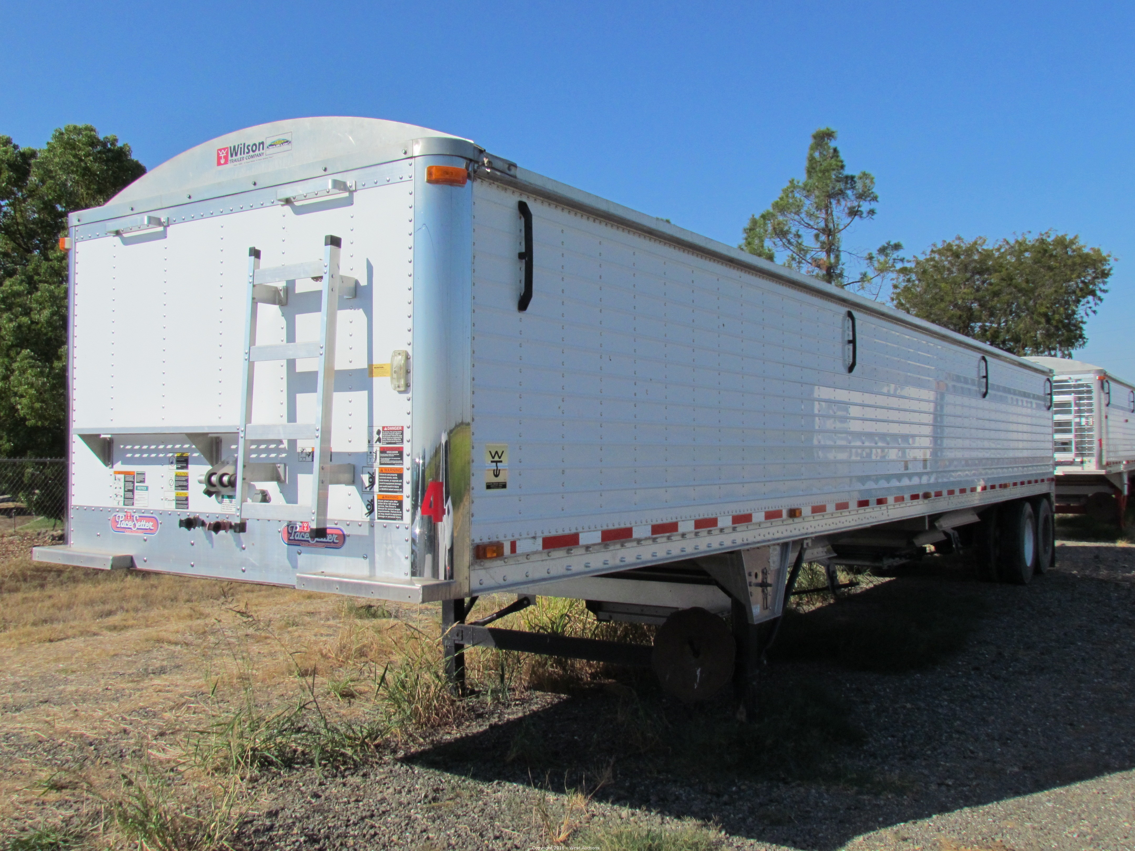 West Auctions Auction Grain Hopper Trailers, Dump Trailer, Chisel