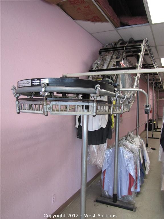 West Auctions Auction Dry Cleaning Equipment ITEM White Up 'N' Down