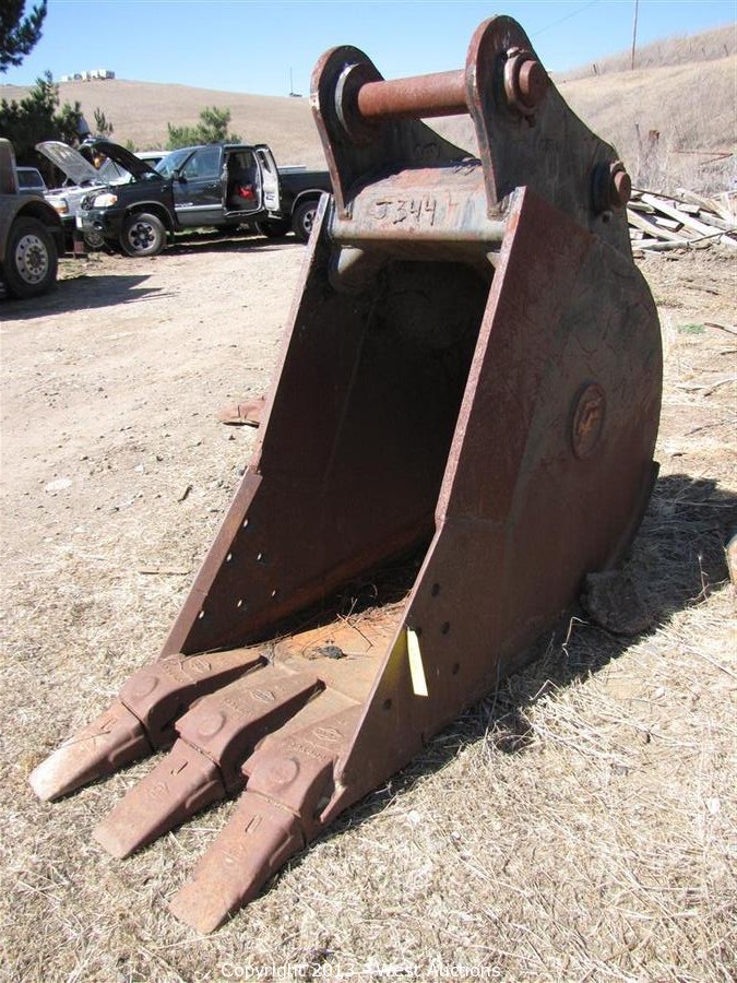 West Auctions Auction Heavy Construction Equipment, Trucks, Trailers, Farm Implements and