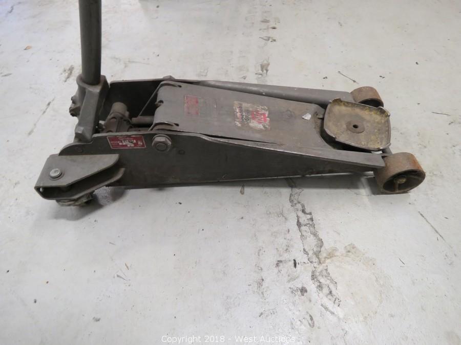 West Auctions Auction Auction of Machines, Tools and Equipment ITEM Napa 2 Ton Floor Jack