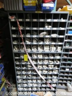 Shelves and Contents: Wide Assortment of PVC Tees, Unions, and Connectors