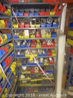 Shelves and Contents: Wide Assortment of PVC Elbows, Tees, 45-Degree Intersections, and Couplers