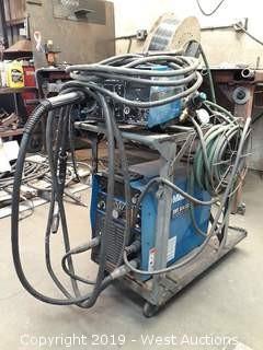 Miller XMT 304 DC Arc Welder With Cart, Feeder, Leads, Gun And Accessories 
