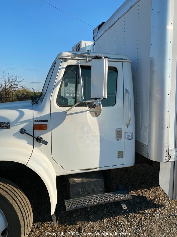West Auctions Auction International Box Truck, 20ft Flatbed Trailer
