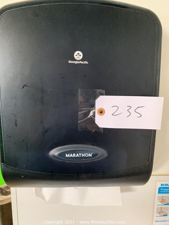 West Auctions Auction Indoor Playground & Restaurant Auction ITEM Marathon Manual Pull Paper