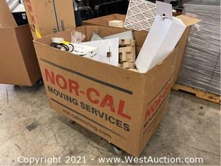 Box Of Telecomm Equipment And Power Strips