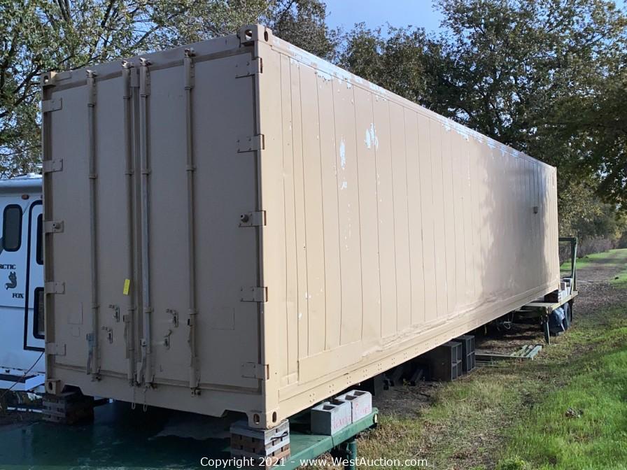 Online Auction of 20' Artic Fox Popout Camper with Generator Chassis Trailer, 40' Converted Sea Container, 5-Ton Flatbed Trailers, and More