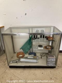 Assorted Motorcycle Parts and Display Case