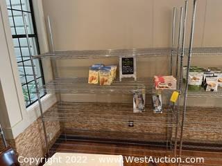 Metro Rack And Contents: Assorted Packaged Foods And Chalk Sign A-Frame