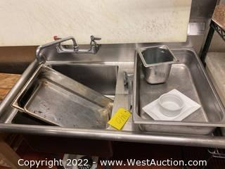 Contents Of Sink: Assorted Cooking Trays And More