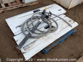 Contents Of Pallet: (1) F150 Tailgate, (1) Dakota SLT Tailgate, Conduit Assembly Line, and (1) Trailer Hitch