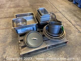 Contents Of Pallet: Iron Caddy With Silicone Rest, (4) Assorted Woks, (14) Assorted Stainless Steel Trays, (3) Assorted Stainless Steel Pans, And More