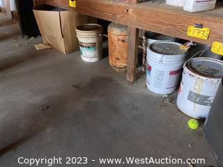 Contents Under Shelf: Assorted Buckets Of S200 White Silicone Coating, Propane Tank, And More