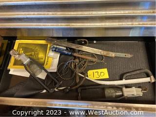 Contents of Drawer: (2) Drill Shears, Gripbar, and Saw Blade