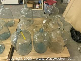 (7) Large And (6) Small Glass Jugs 