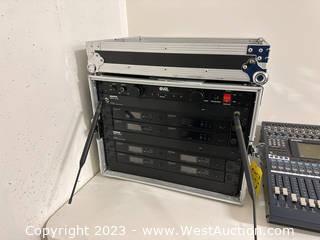 Rack with (8) Shure QLXD4 Digital Wireless Receivers, (2) Power Distribution Systems, and Power Conditioner
