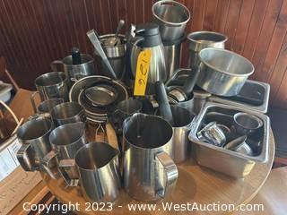 Contents of Table: Assorted Stainless Steel Kitchenware 