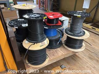 Contents of Pallet: Approximately (13) Assorted Spools of Communications Cable 