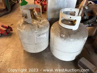 (2) Partial Filled Propane Tanks