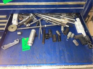 Contents of Drawer: Assorted Driveline Components, Reverse Gear Positioning Gauge, and Assorted Sockets
