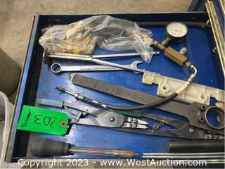 Contents of Drawer: Psi Gauge, Craftsman Wrench, Gasket Pliers, and More