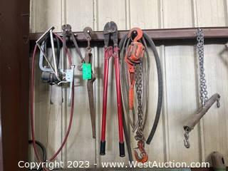 Contents Hanging on Wall: Bolt Cutters, Nail Pullers, Chain Ratchet, and More