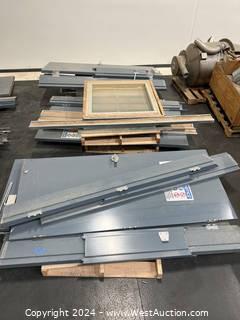 Contents Of (3) Pallets: (4) Steel Doors, Framing, And (2) Framed Windows 