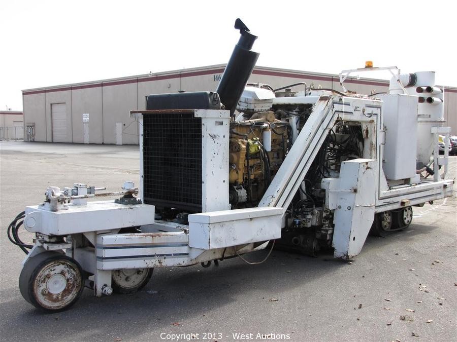 West Auctions Auction Highway Concrete Grinders and Volumetric 10 Yd