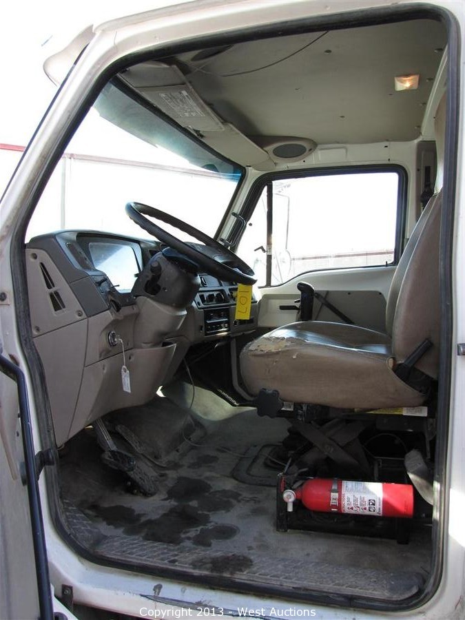 West Auctions Auction Highway Concrete Grinders and Volumetric 10 Yd